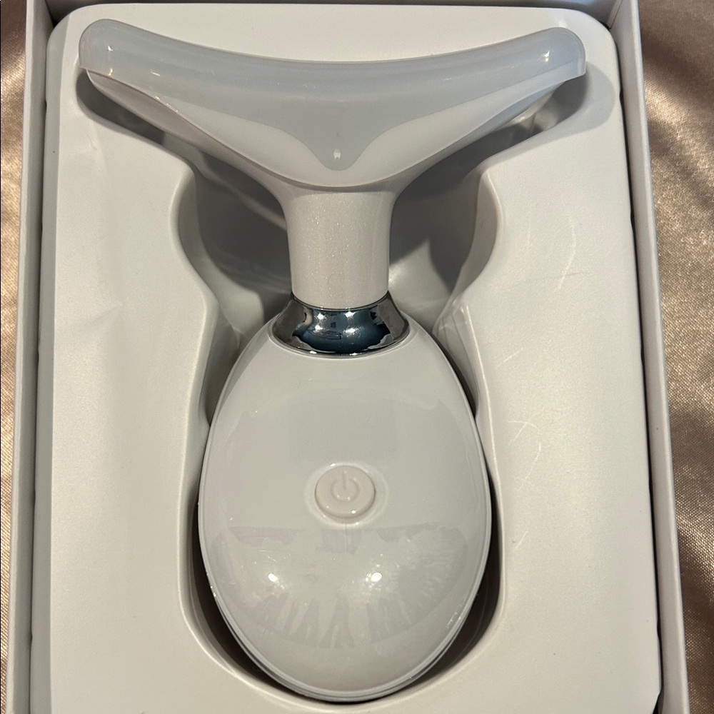 Ergonomic White Facial Massager
